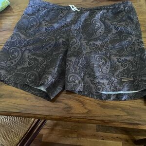 2 swim suits Nike Black Swim Trunks  and Black Brown 1826 swimsuit.